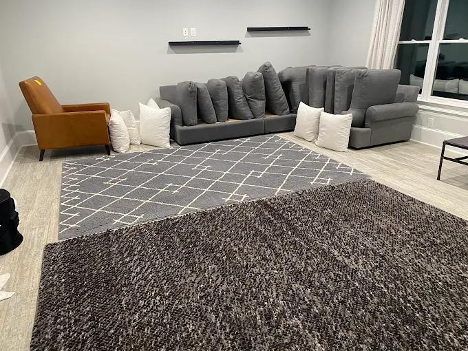 Freshly cleaned living-room carpet and area rugs in a Marietta home